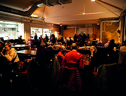 Under-threat club reopens as community hub 