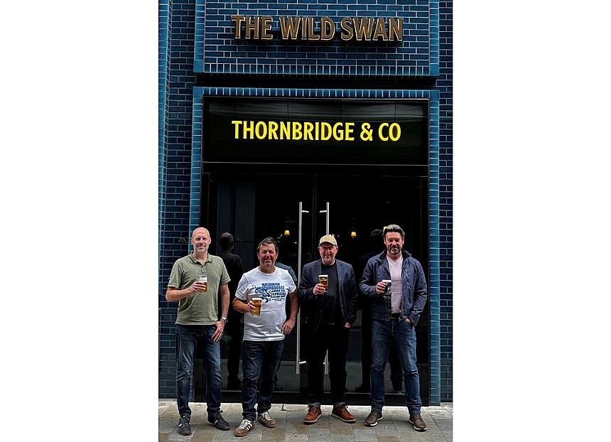 Swan flying high in heart of capital