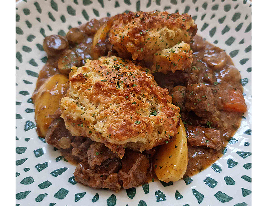 Venison casserole with cherry beer and cheesy dumplings