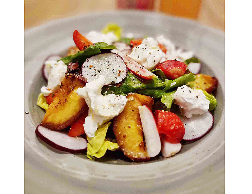 Summer fruit and goat’s cheese salad with Henry Hogz Raspberry Sour vinaigrette